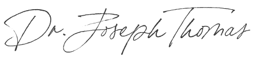 Handwritten signature reading “Dr. Joseph Thomas”