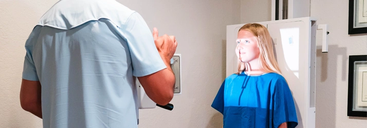 Patient using the digital x-ray machine at Joshua Spine and Health Center