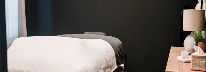 Massage table in therapy room