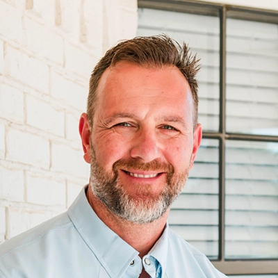 Professional headshot of Dr. Joseph Thomas